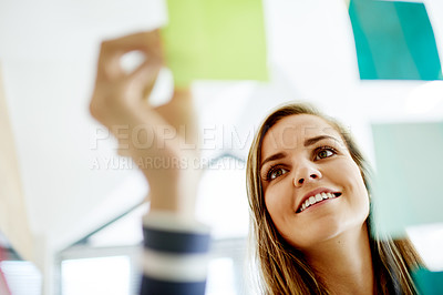 Buy stock photo Writing, sticky notes and business woman by glass for brainstorming, planning and project agenda. Creative agency, happy and person with tasks, reminder and ideas for schedule, strategy and proposal