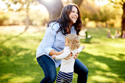 Buy stock photo Outdoor, laugh and mother with child for support, relationship and connection together in park. Happy family, mom and girl with love for bonding, caring and playful on weekend holiday in nature