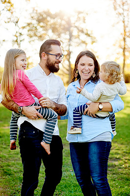 Buy stock photo Parents, family and girls in park, funny and bonding together with happiness, nature and playing. Outdoor, mother and father with kids, development and smile with daughters, summer holiday and break