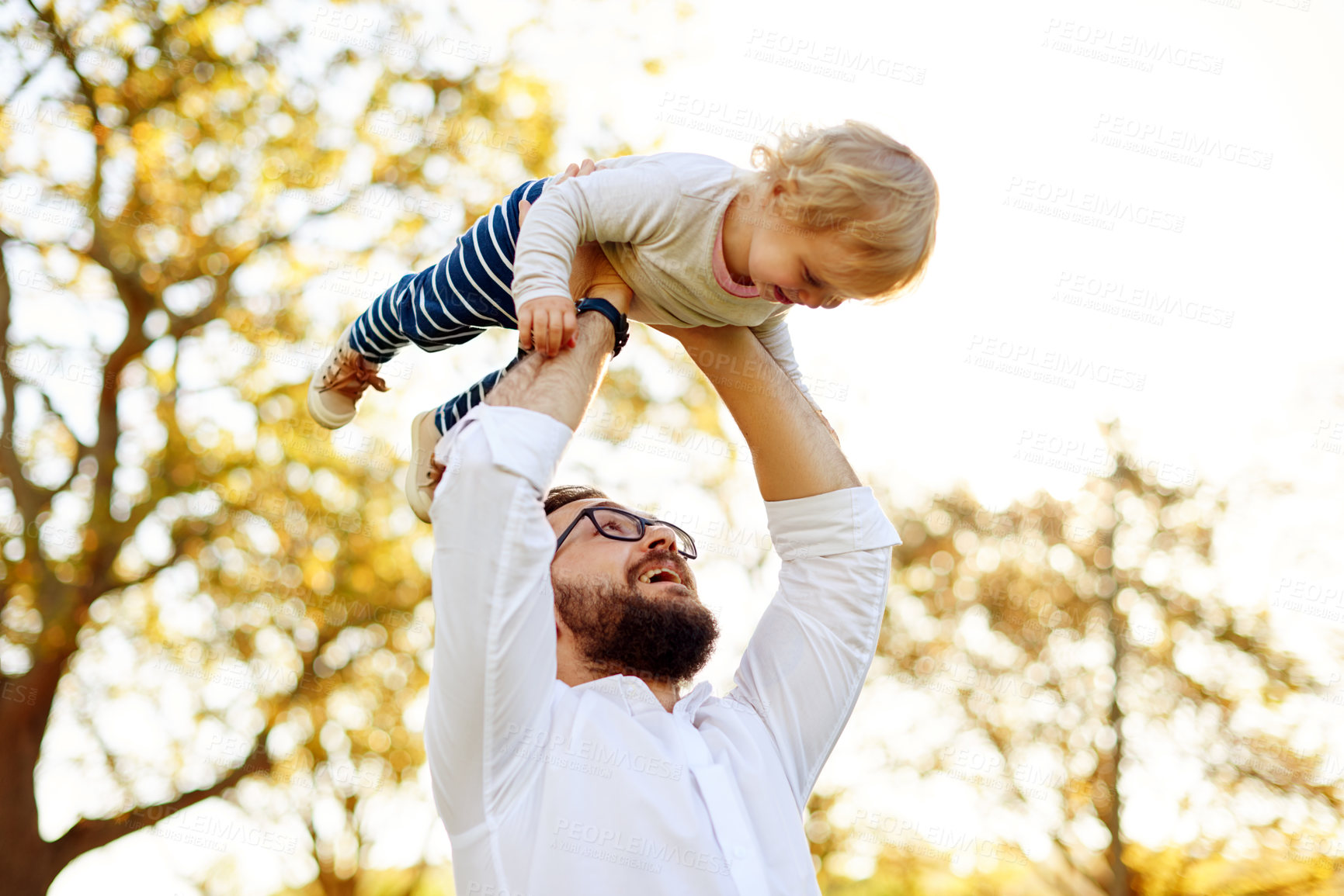 Buy stock photo Dad, girl and airplane with games at park, lift and happy family with low angle, nature and bonding in summer. People, father and child with flight, playful or excited with smile outdoor in Australia