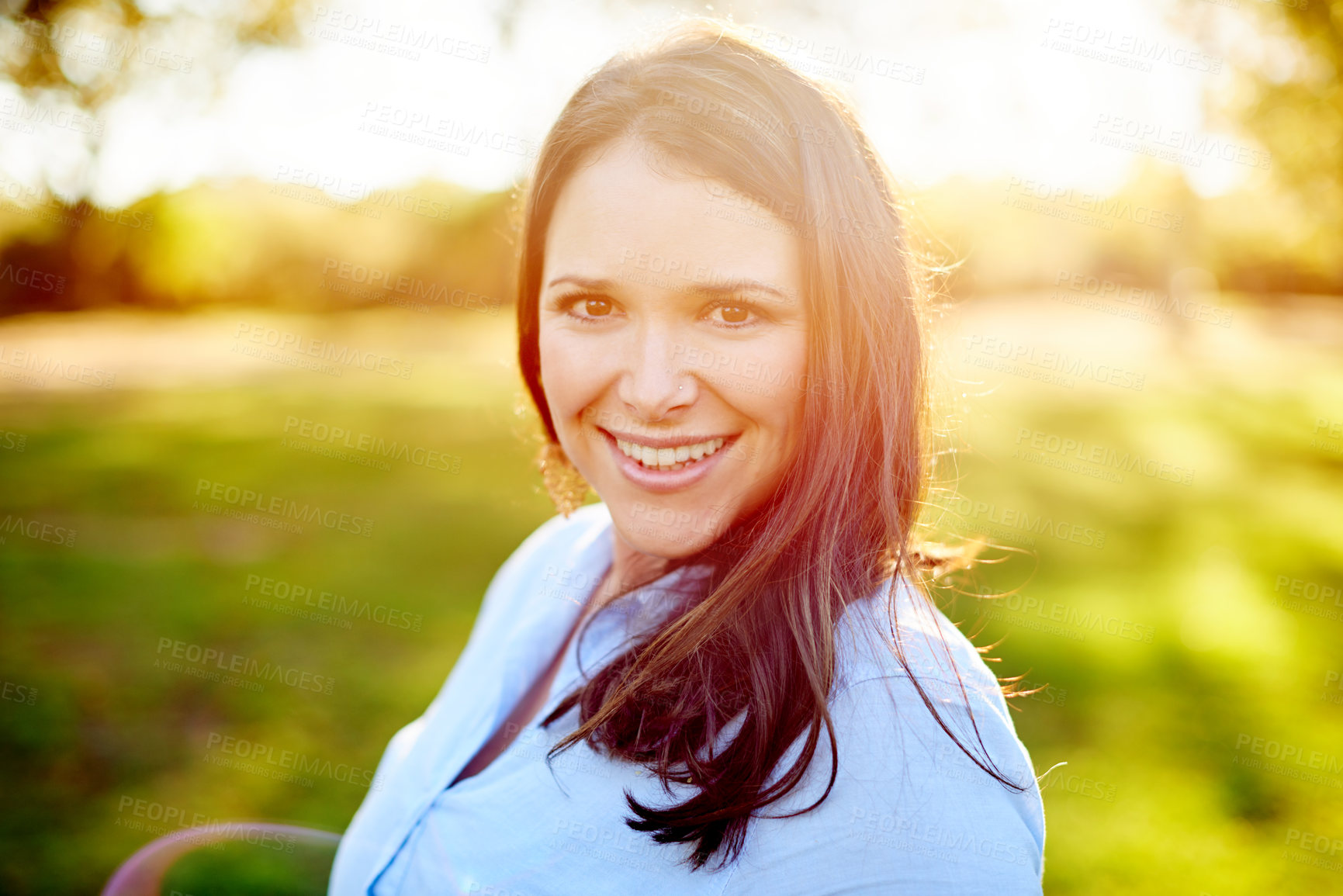 Buy stock photo Portrait, outdoor and woman in nature with smile, fresh air and freedom in weekend break. Happiness, wellness and female in garden with positivity, sunshine and good mood on summer getaway. 