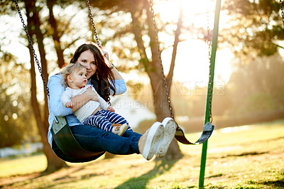 Buy stock photo Affection, mom and swing with child, playground and game for toddler in nature and playing with girl. Outdoor, woman and fun with daughter on weekend, happy or childcare on holiday, family and park
