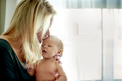 Buy stock photo Mother, newborn or kid in home with kiss, bonding and affection with space and love for family. Calm, peace and baby in arms of mom, development and moment with woman for motherhood at house