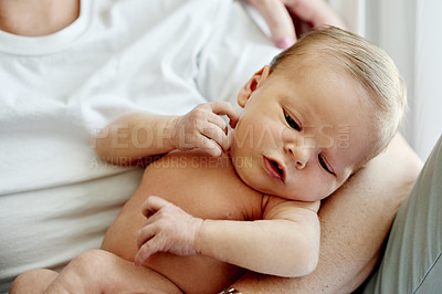 Buy stock photo Baby, newborn and relax in arms of parents with bonding, care and wellness of child in family home. Peace, calm and healthy infant with childcare, parenthood and connection for growth in house