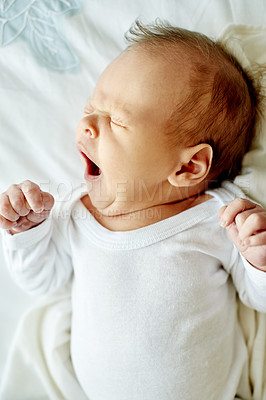 Buy stock photo Baby, sleeping and bed with yawn on sheet for nap time, rest or tired snooze in home. Newborn, child or kid asleep with eyes closed or relax on duvet for youth, peaceful slumber or fatigue in house