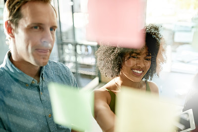 Buy stock photo Solution, reading or people with sticky note on glass for brainstorming, tasks or project strategy. Smile, collaboration and creative designers in meeting for startup, teamwork and planning ideas