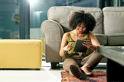 Buy stock photo Happy woman, social media and laughing with tablet in home for funny post or network. Female person, user or scrolling with smile, technology or app for comedy, humor or connection on floor in house