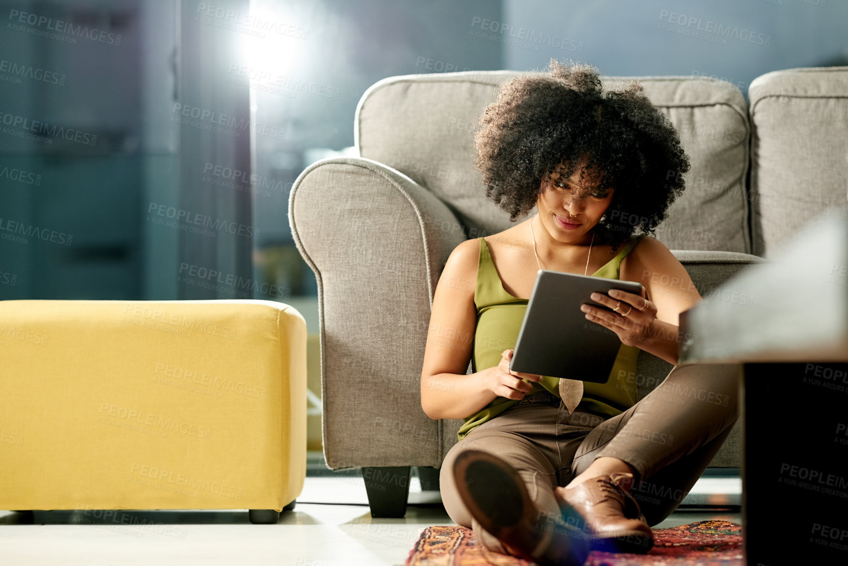 Buy stock photo Woman, fashion designer and research with tablet in home for online course, styling tips or network. Female person, user or scrolling with technology for clothing trend or app on floor in house
