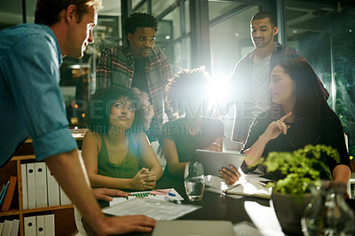 Buy stock photo Discussion, people and graphs in office with tablet, communication and feedback for overtime. Meeting, teamwork or diversity at night with flare, planning and collaboration for project report.
