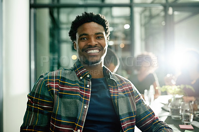 Buy stock photo Portrait, night and man in office with smile, career pride and brainstorming in startup meeting. Happy, lens flare or employee in boardroom with colleagues, late shift and planning for small business