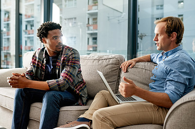 Buy stock photo Laptop, discussion and business men in office on sofa for planning creative project in collaboration. Talking, computer and male magazine copywriters working on article for publishing in workplace.