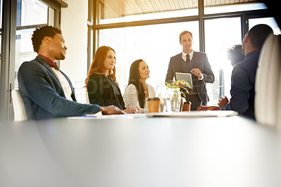 Buy stock photo Presentation, manager and business people in office on tablet for finance review, feedback and space. Professional, corporate and man with workers for financial report, discussion and proposal