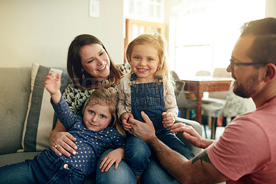 Buy stock photo Mom, dad and portrait of girls on sofa in living room of home together for bonding or break. Development, growth or love with children siblings and parents in apartment for family time or security