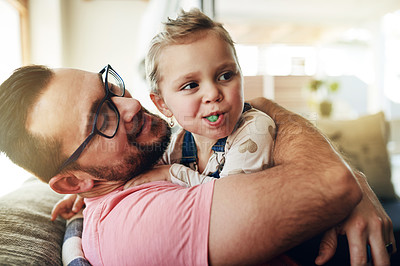 Buy stock photo Love, father and daughter in home with hug, bonding together and parent safety in connection. Relax, support and happy family in living room with embrace, care and trust for childhood development.
