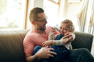 Buy stock photo Happy, father and play with child on sofa for love, affection and funny games for weekend break. Smile, man and embrace with toddler laughing for fun together, family bonding and support at house
