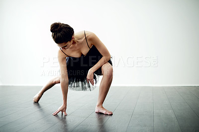 Buy stock photo Balance, routine or woman on floor for ballet practice, creative dancing or training. Wall, white background or flexible dancer in studio with grace, space or talent for exercise, hobby or ballerina