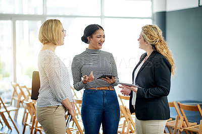 Buy stock photo Business women, laugh and team at conference for insurance, planning and tablet. Collaboration, seminar and conversation with tech at workshop for development, policy ideas and funny joke in office