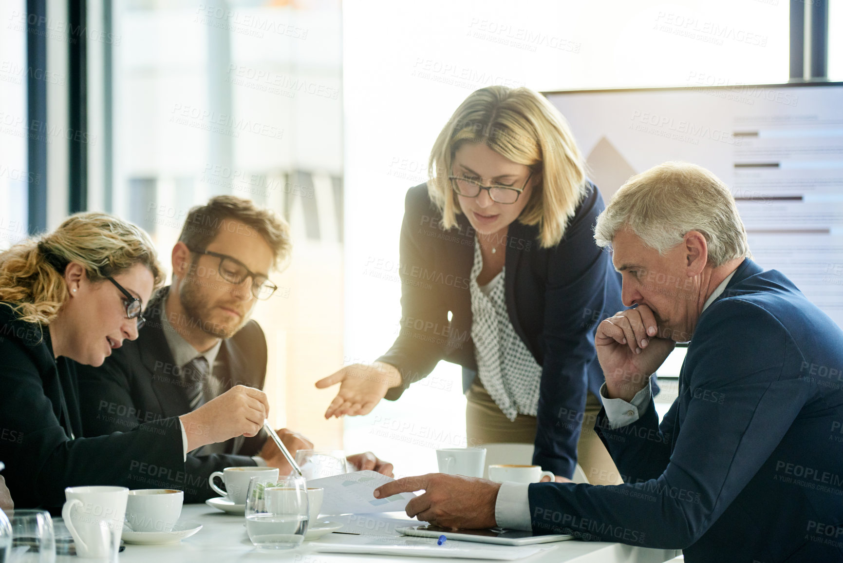Buy stock photo Meeting, speaker and documents with business woman in office for financial data, audit team or report. Budget performance, treasury account and paperwork with employees in agency for investing profit