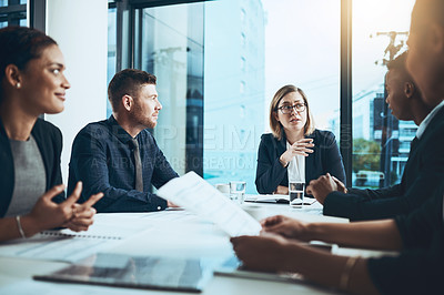 Buy stock photo Business people, meeting and conversation with document in office for report, analysis or project. Accounting, employees and feedback with tech for brainstorming, planning or proposal for insight