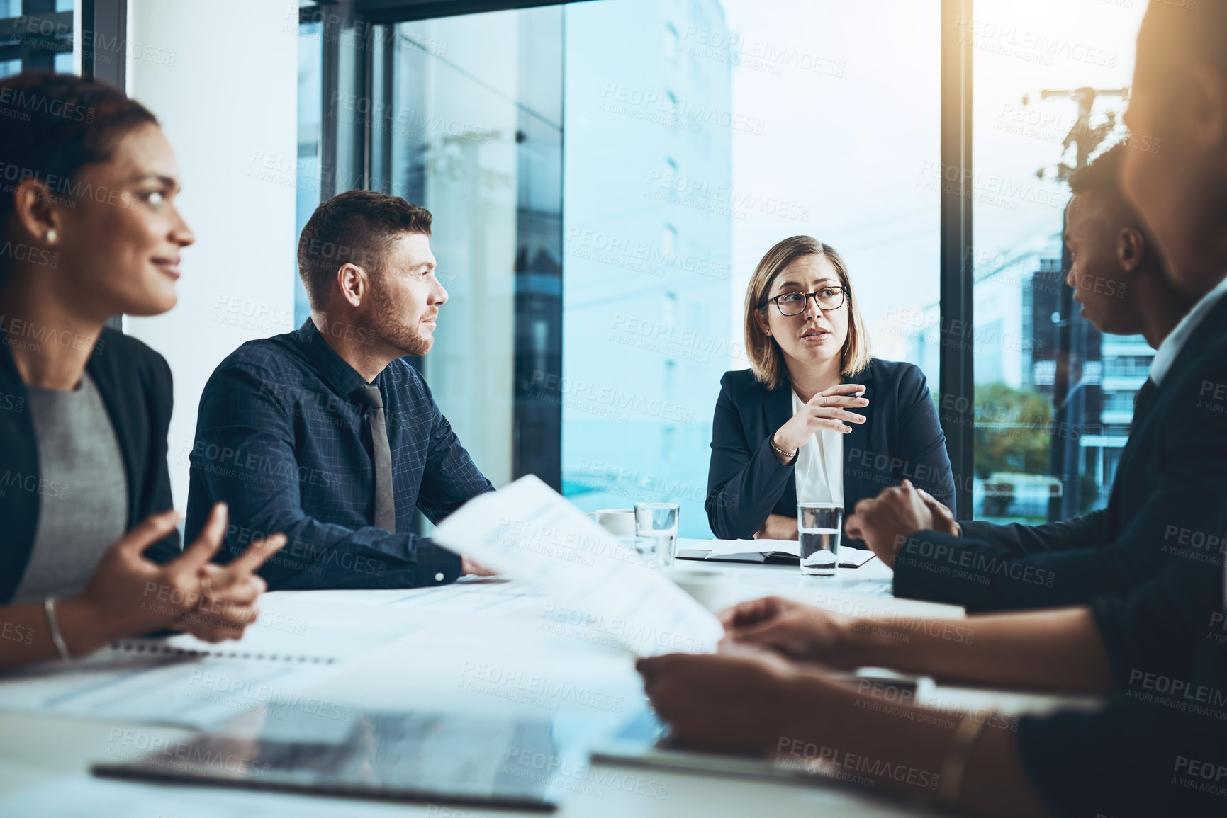 Buy stock photo Business people, meeting and conversation with document in office for report, analysis or project. Accounting, employees and feedback with tech for brainstorming, planning or proposal for insight