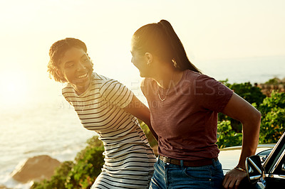 Buy stock photo Happy women, friends and relax with car for road trip, adventure or sightseeing journey together. Female people, holiday or bonding with vehicle for outdoor stop, travel or destination on ocean coast