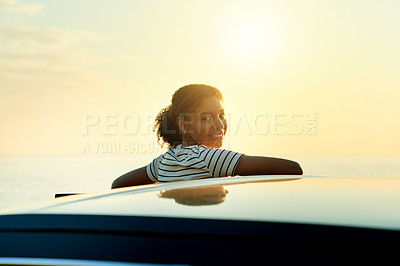 Buy stock photo Happy woman, portrait and car with sunset view for travel, holiday or weekend getaway in nature. Female person, driver or traveler with smile, sky or relax for road trip adventure, stop or journey