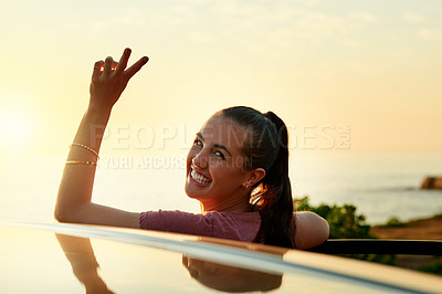 Buy stock photo Happy woman, portrait and peace sign with car for travel, outdoor holiday or sunset view. Female person, driver or smile with hand gesture or vehicle for stop, road trip adventure or weekend getaway