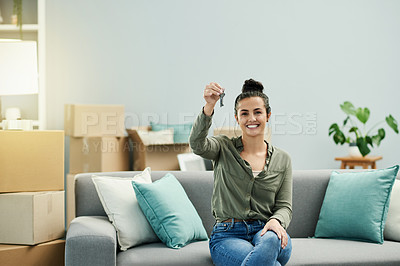 Buy stock photo New home, happy and portrait of woman with keys for property, moving and house purchase. Homeowner, real estate and person on sofa with keychain excited for mortgage, investment and rental apartment