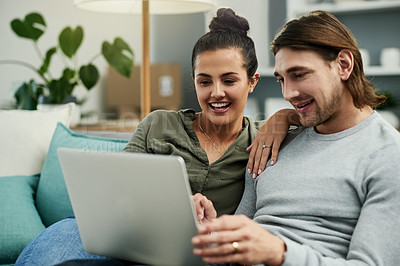 Buy stock photo Laptop, relax and streaming with couple on sofa in living room of home together for entertainment. Computer, subscription service and watching video with happy people in apartment for bonding