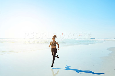 Buy stock photo Athlete, woman and run for fitness on beach for exercise, cardio training and endurance routine. Mockup space, person and jog with blue sky, sports workout and marathon practice on ocean for wellness