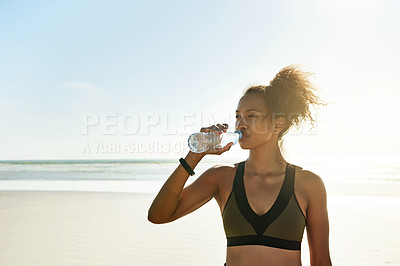 Buy stock photo Woman, fitness and drinking with water bottle on beach for recovery, rest or break in nature. Active, female person or thirst for mineral liquid, natural sustainability or hydration on mockup space