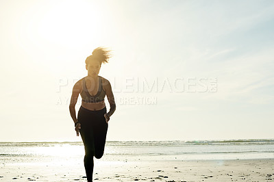 Buy stock photo Cardio, running and woman on beach for exercise, fitness and endurance training in nature. Serious, mockup space and African athlete by ocean for marathon practice, pace and commitment on coast.