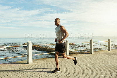 Buy stock photo Athlete, black man and running for fitness on promenade for exercise, cardio training and endurance. Male person, runner and morning jog for sports workout, marathon practice and pace for wellness