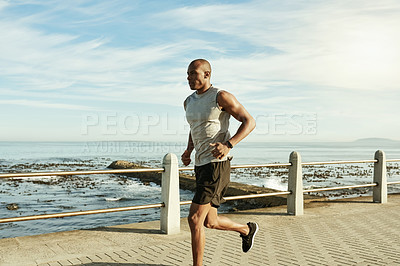 Buy stock photo Athlete, black man and running for fitness at beach for training, cardio exercise and endurance. Male person, space and runner jogging for sports workout, marathon practice and wellness on promenade
