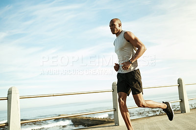 Buy stock photo Athlete, black man and running for training on promenade for fitness, cardio exercise and endurance. Male person, space and runner jogging for sports workout, marathon practice and pace for wellness