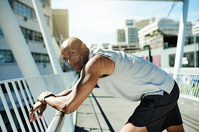 Buy stock photo Black man, portrait and fitness with break on bridge for workout, exercise or health and wellness. Active, male person or runner with rest or recovery for outdoor physical training in an urban town