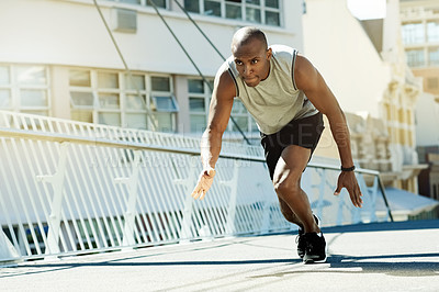 Buy stock photo Athlete, black man and running in city for fitness, start exercise and competition. Male person, runner and preparation for race challenge, sports workout and marathon practice for wellness outdoor
