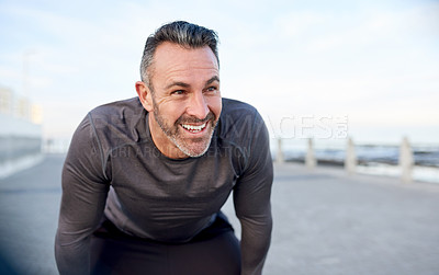 Buy stock photo Mature, man and happy for workout break with fitness fatigue, overworked and tired of running challenge. Space, athlete and rest at promenade with exercise burnout, endurance and recovery from cardio
