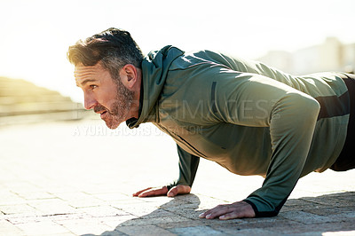 Buy stock photo Fitness, push up and mature man in city for bodybuilding training, exercise or workout in morning. Sports, outdoors and person with strength, wellness and health for performance, muscles or challenge