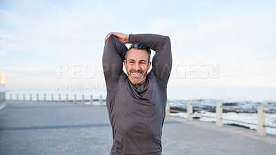 Buy stock photo Happy, mature man and stretching outdoor for workout preparation, getting ready and muscle relief. Space, arms warm up and active at promenade for cardio, wellness challenge and exercise performance