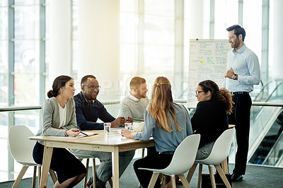 Buy stock photo Meeting, presentation and laugh with business man in office for whiteboard, timeline and project progress. Speaker, joke and schedule feedback with employees in agency for brainstorming proposal