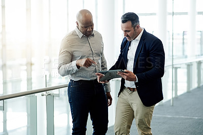 Buy stock photo Corporate, tablet and business men in office in discussion for online proposal, project and financial review. Team, meeting and people on digital tech for planning, collaboration and finance report