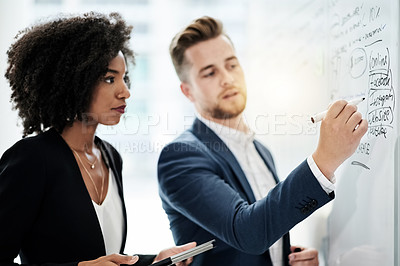 Buy stock photo Whiteboard, tablet and business people in meeting for solution, finance proposal and feedback. Office, collaboration and man with woman writing for financial planning, revenue insight and budget