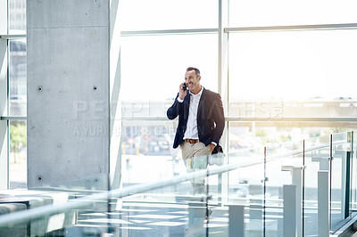 Buy stock photo Phone call, smile and walking with business man in foyer for feedback, negotiation or update. Communication, conversation and thinking with mature employee in lobby of office for project management