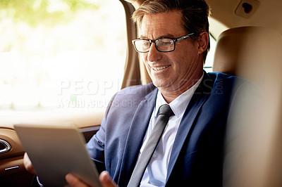 Buy stock photo Tablet, happy and businessman in car with communication, networking or email online for career. Smile, digital technology and mature corporate manager with contact on app in vehicle for transport.