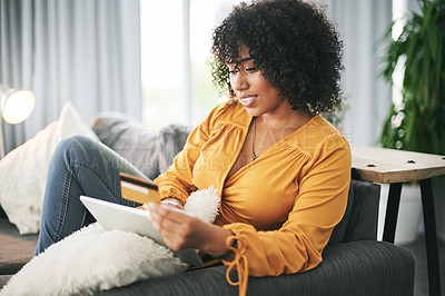 Buy stock photo Woman, tablet and credit card on couch for ecommerce, bills and discount sale on web at home. Person, smile and relax on sofa with fintech application, online shopping and easy payment at apartment