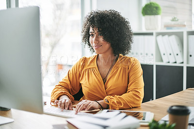 Buy stock photo Business, woman and typing at computer for editing, article review or fact check at creative agency office. Research analysis, tech and African editor at desk for copywriting project in workplace