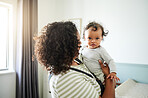 Love, bonding and woman with baby in his nursery bonding, playing and connecting at their home. Happiness, smile and young mother holding her infant newborn boy in the bedroom of their modern house.