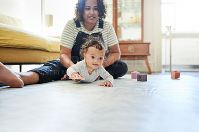 Buy stock photo Mother, baby and playing in home living room with toys for development, growth and bonding. Woman and child together for family time, crawling and support while learning for fun on mock up floor