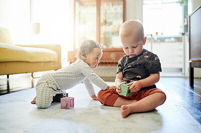 Buy stock photo Baby building, home and kid toys for mobility development and learning together in a bedroom. Nursery, toy brick and cute children curious about youth block game and activity in a house on the floor